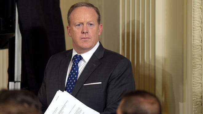 Spicer waits for the start of a bill signing event for the Department of Veterans Affairs Accountability and Whistleblower Protection Act of 201y in the East Room of the White House on June 23, 2017.