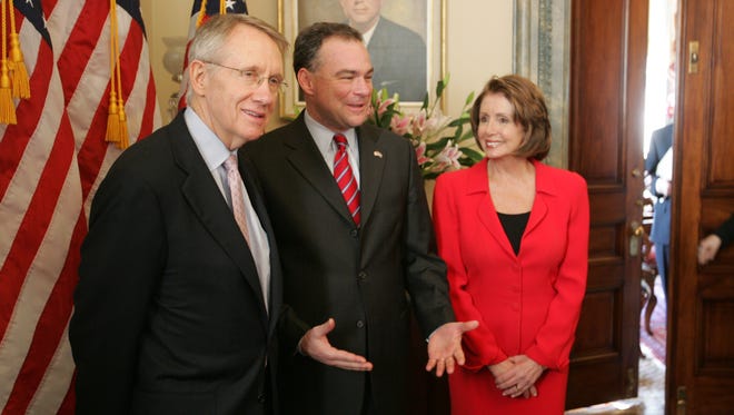 Kaine meets with Senate Minority Leader Harry Reid and House Minority Leader Nancy Pelosi in the Capitol on Jan. 31, 2006, as he prepared to deliver the Democrats' rebuttal to President Bush's State of the Union Address.