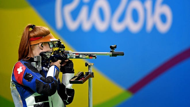 Nina Christen of Switzerland shoots during the women's 50-meter three position finals in the Rio 2016 Summer Olympic Games at Olympic Shooting Centre.