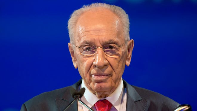 A file picture dated June 20, 2013 shows former Israeli president Shimon Peres speaking during the closing session of the 'Facing Tomorrow' conference in Jerusalem, Israel.