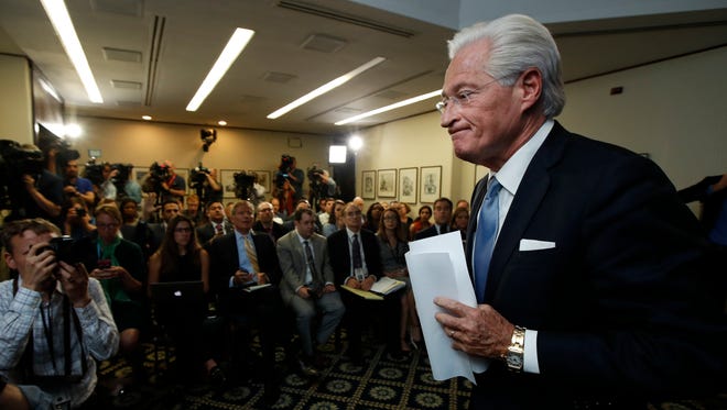 Marc Kasowitz, personal attorney of President Trump, leaves a packed room at the National Press Club in Washington on June 8, 2017.