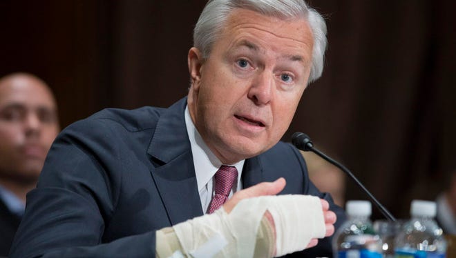 Chairman and CEO of the Wells Fargo and Company John Stumpf responds to a question from Democratic Senator from Massachusetts Elizabeth Warren (not pictured) during the Senate Banking, Housing and Urban Affairs Committee hearing on 'An Examination of Wells Fargo's Unauthorized Accounts and the Regulatory Response', on Capitol Hill in Washington, DC, USA, 20 September 2016.