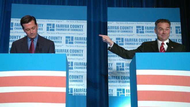 Kaine points at his Republican rival in the governor's race, Jerry Kilgore, during a debate sponsored by the Fairfax Chamber of Commerce on Sept. 13, 2005, in McLean, Va.