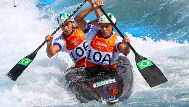 Charles Correa and Anderson Oliveira of Brazil compete during men's canoe double semifinals in the Rio 2016 Summer Olympic Games at Whitewater Stadium.