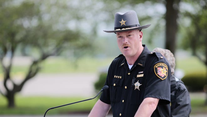 Pike County Sheriff Charles Reader gives an update on the Rhoden murders at an April 27 press conference at the makeshift command center in Waverly.