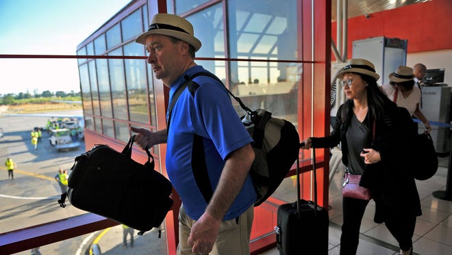 American Airlines passengers arrive at Jose Marti International Airport in Havana on Nov. 28, 2016.