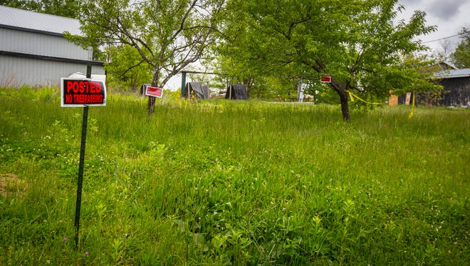 May 17, 2016: "No Trespassing" signs are visible on the property where Christopher Rhoden Sr and Gary Rhoden were found shot and killed. Christopher Sr.'s mobile home was seized by the Pike County Sheriff and the Ohio Bureau of Criminal Investigations.

After more than three weeks of gathering evidence in the April 22 killings that left seven family members and a fiancee dead, authorities have released the Rhoden properties on Union Hill and Union roads to surviving relatives.

Authorities released the property back to the families late Monday, said Dan Tierney, spokesman for the Ohio Attorney GeneralÕs office.