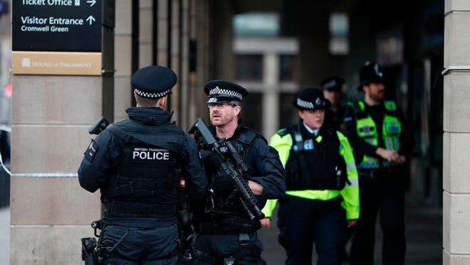 Armed police secure the area across the road from the Palace of Westminster in central London on March 23, 2017.