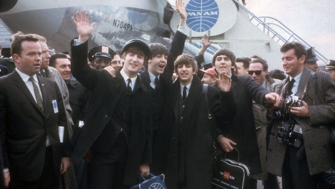 The Beatles arrive in New York on Feb. 7, 1964, for their first U.S. appearances. When the band played 'Ed Sullivan,' "it was exciting, it was fresh, it was what everybody was talking about," says Howard, who was 9 at the time.