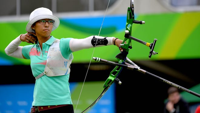 San Yu Htwe of Myanmar competes during an archery event at Sambodromo in the Rio 2016 Summer Olympic Games.