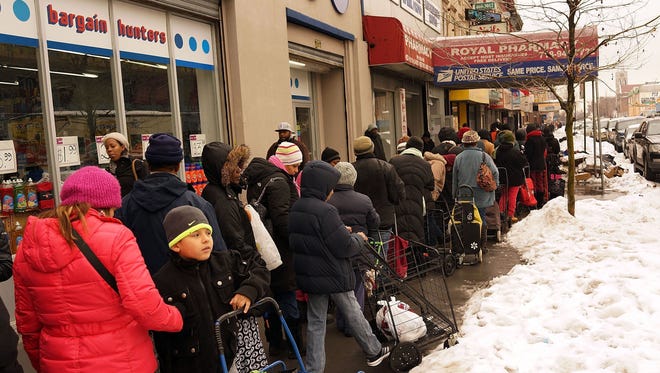 People wait in line for food in Brooklyn on Feb. 18, 2017.
