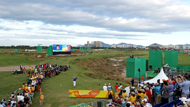An overall view of the first tee as Adilson Da Silva of Brazil hits his tee shot hits his tee shot during the first round of men's golf in the Rio 2016 Summer Olympic Games at Olympic Golf Course.