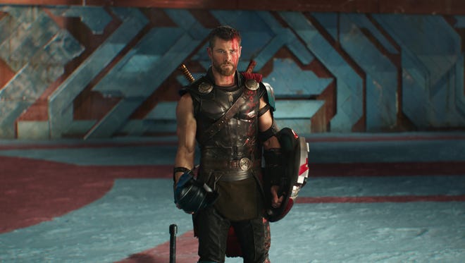 Thor (Chris Hemsworth) faces new battles in a strange world in 'Thor: Ragnarok.'