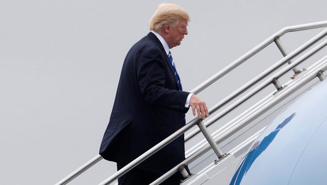President Trump boards Air Force One on Friday.