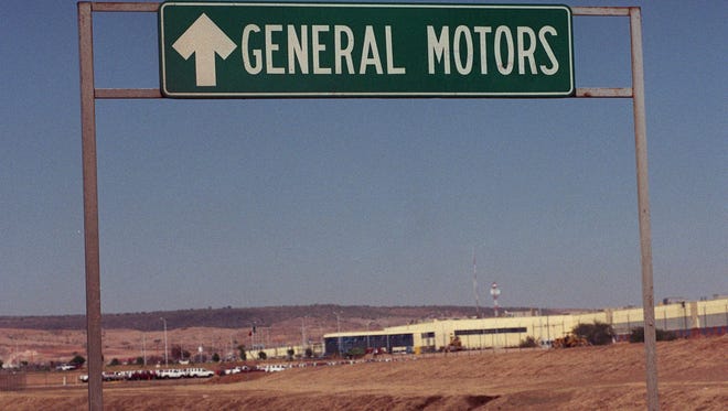A sign announced the entrance to GM plant in Silao, Mexico, in this 1998 file photo