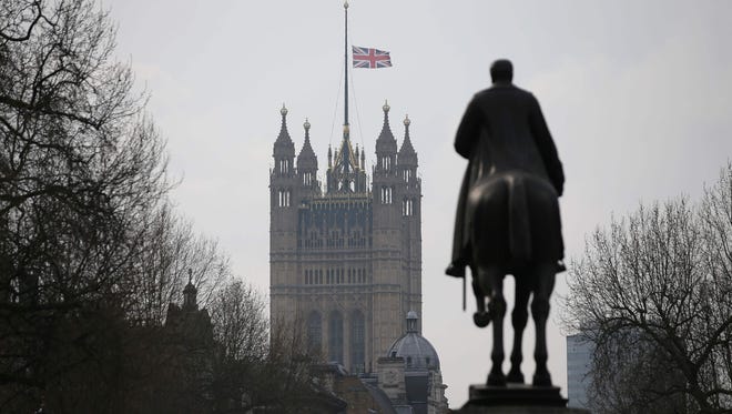 A Union flag flies at half mast at the Houses of Parliament on March 23, 2017.