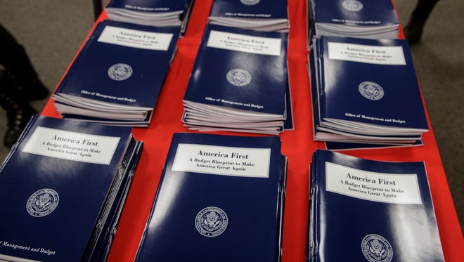 Copies of President Trump's first budget are displayed at the Government Printing Office on March, 16, 2017.