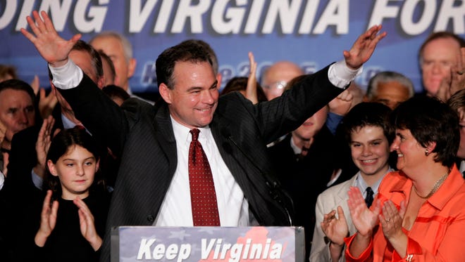 Tim Kaine waves to the crowd during a victory celebration in Richmond, Va., on Nov. 8, 2005, after he defeated Republican challenger Jerry Kilgore in the state's gubernatorial election.