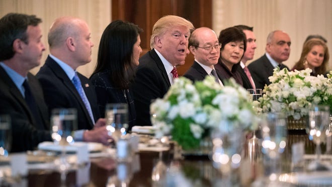 President Trump delivers remarks while hosting ambassadors from the 15 country members of the United Nations Security Council with U.N. Ambassador Nikki Haley in the State Dining Room at the White House on April 24, 2017.