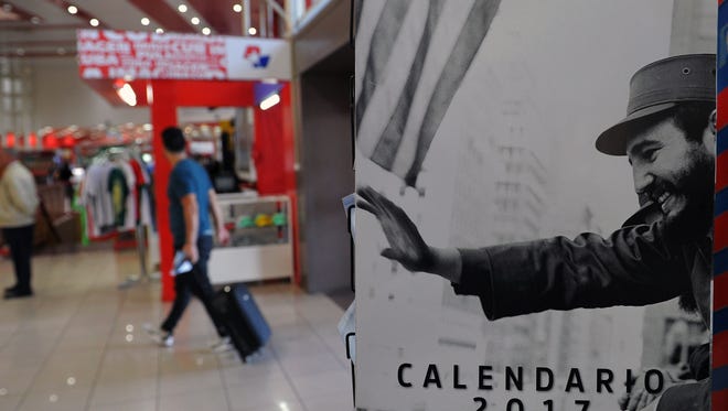 A 2017 calendar with pictures of Cuban leader Fidel Castro is displayed for sale at the Havana airport on Nov. 28, 2016.