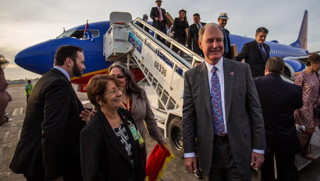 Southwest Airlines CEO Gary Kelly (center) is seen as the carrier made its  maiden flight to Havana, Cuba, on Dec. 12, 2016.