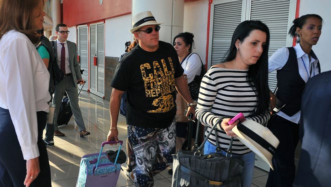 American Airlines passengers arrive at Jose Marti International Airport in Havana on Nov. 28, 2016.