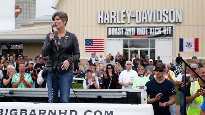 Sen. Joni Ernst thanks participants for coming out Saturday, Aug. 27, 2016, as they get ready to head out from the Big Barn Harley Davidson dealership to the Iowa State Fairgrounds for the second annual Roast and Ride in Des Moines.