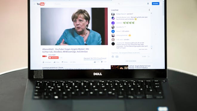 The YouTube website is pictured on a laptop computer during an interview between blogger Ischtar Isik (not seen) and German Chancellor Angela Merkel on the occasion of the YouTube production '#DeineWahl - YouTuber fragen Angela Merkel' in Berlin, Germany, on August 16, 2017.