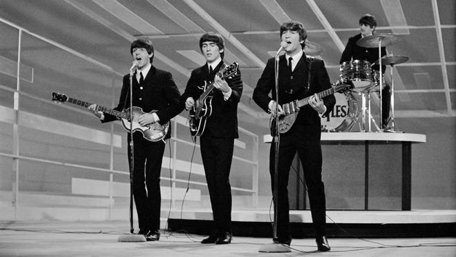 The Beatles make their first appearance on 'The Ed Sullivan Show' on Feb. 9, 1964. "Without us as this tight little band ... there wouldn't be any catalog," McCartney says. "There just wouldn't be."