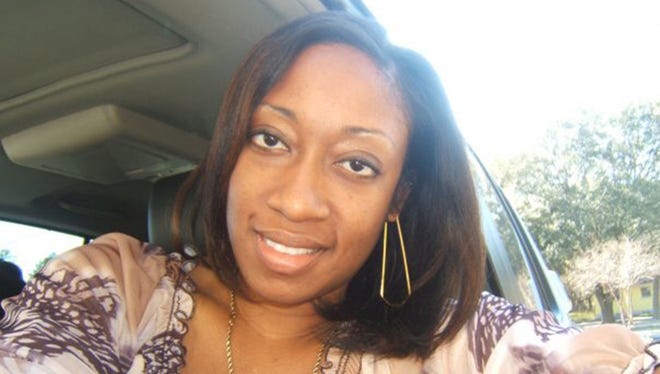 Undated family photo shows Marissa Alexander in Tampa, Fla. Alexander had never been arrested before she fired a bullet at a wall one day in 2010 to scare off her husband when she felt he was threatening her. On Monday, Nov. 24, 2014, Alexander agreed to a plea deal that ordered her to serve three years in prison. She will be credited for 1,030 days served and has 65 days remaining.