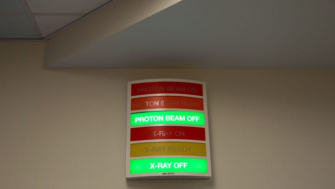 December 14, 2015 - A lighted sign outside the a proton beam therapy room informs when the proton beam or the cone beam X-ray computed tomography scanner are in use at the St. Jude Red Frog Therapy Center. The center is the world's proton therapy center dedicated to the treatment of children. (Mike Brown/The Commercial Appeal)