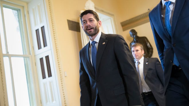 Ryan strides to the chamber as the House and Senate rush to send President Obama a massive budget package on Dec. 18, 2015.