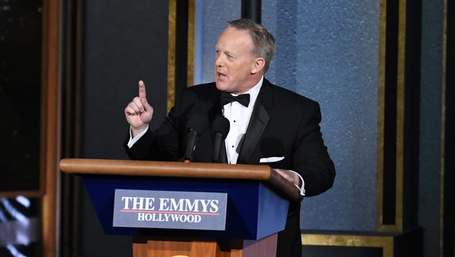 Former White House Press Secretary Sean Spicer appears in the opening number during the 69th Emmy Awards in Los Angeles on Sept. 17, 2017.