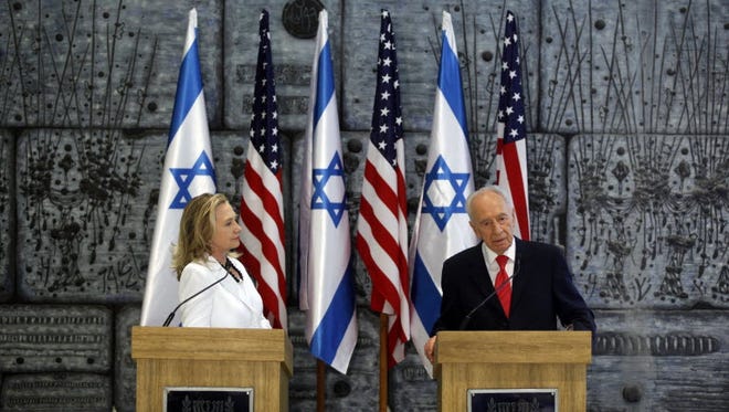 Secretary of State Hillary Clinton and Israeli President Shimon Peres in Jerusalem in 2012.