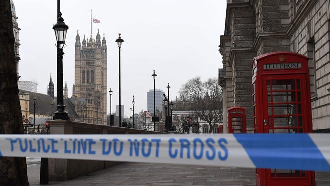 A police security cordon remains around the Houses of Parliament on March 23, 2017, in London.