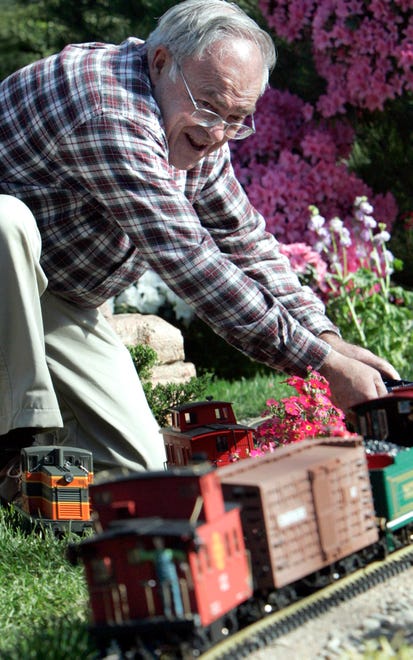 Bill Cozzens of Oconomowoc enjoys a day in the Mitchell Park Domes, running G-scale model trains during the train show in February, 2007.