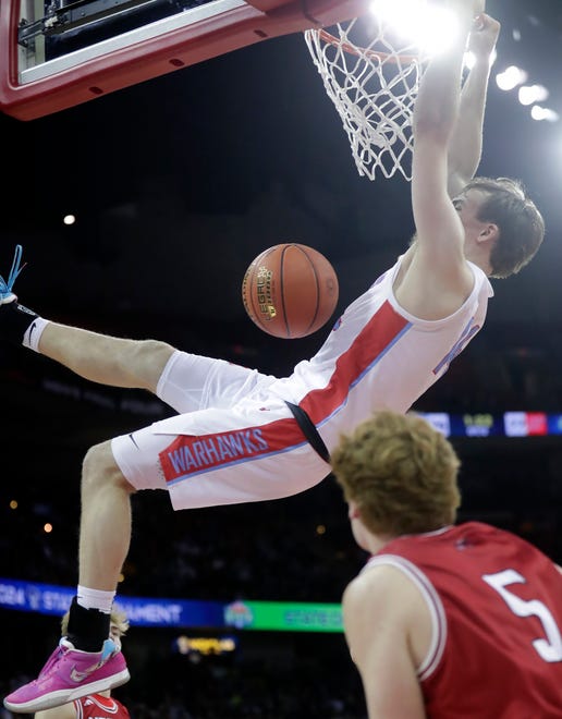 Arrowhead High School's Bennett Basich (14) dunks against Neenah High School in a Division 1 semifinal game during the WIAA state boys basketball tournament on Friday, March 15, 2024 at the Kohl Center in Madison, Wis. Arrowhead defeated Neenah for 99-95 in four overtimes.
Wm. Glasheen USA TODAY NETWORK-Wisconsin