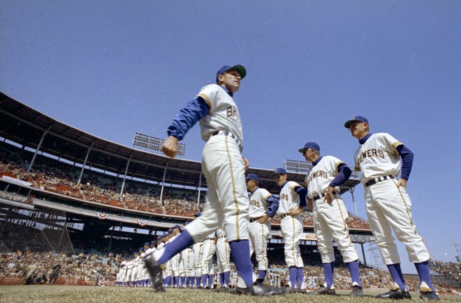 Brewers players line up along first base for introductions in the pre-game ceremony during the Brewers' first opening day on April 7, 1970. Manager Dave Bristol is on the end. The game was also the season opener for the Brewers. A crowd of 37,237 saw the Brewers fall to the California Angels 12-0.