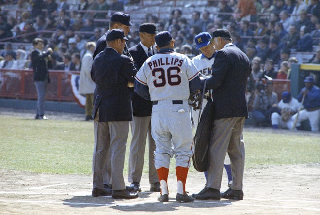 Brewers manager Dave Bristol and Angels manager Lefty Phillips meet with the umpires pre-game during the Brewers' first opening day on April 7, 1970. The game was also the season opener for the Brewers. A crowd of 37,237 saw the Brewers fall to the California Angels 12-0.