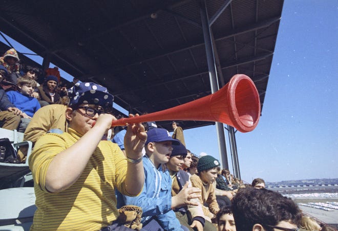 Neighborhood pals Jack Jung, 12, Scott Zuehlke, 12, and Thomas Ehlert, 11, cheer on the Brewers during the Brewers' first opening day on April 7, 1970. The game was also the season opener for the Brewers. A crowd of 37,237 saw the Brewers fall to the California Angels 12-0.