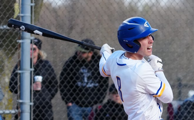 Germantown's Ryan Ferguson (8) connects for a single to right during the game at home against Menomonee Falls on, Friday, April 12, 2024.