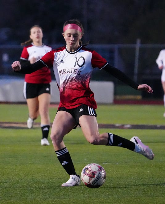 Pewaukee's Kylie Ramerker (10) clears the ball during the match at home against Arrowhead, Friday, April 12, 2024.