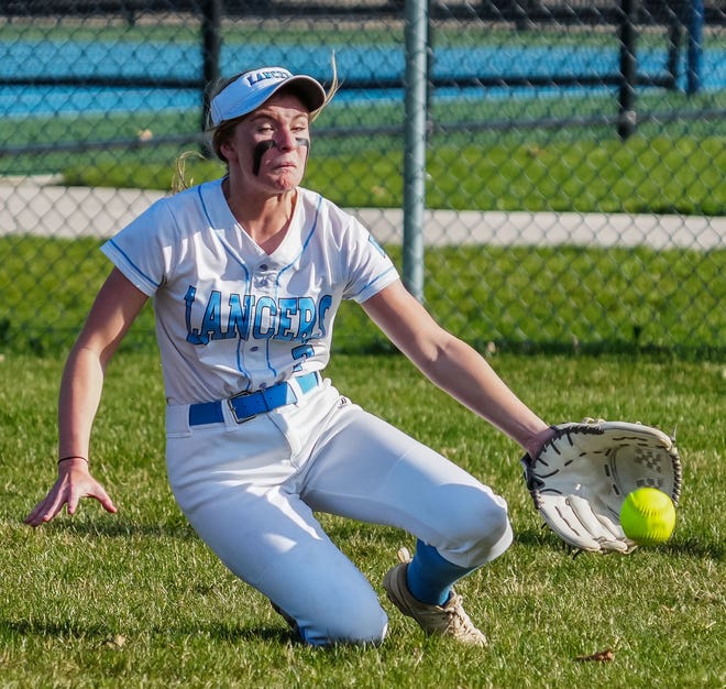 Brookfield Central right fielder Lucy Fahrenholz (7) can't reach a fly ball during the game at home against Menomonee Falls, Monday, April 15, 2024.