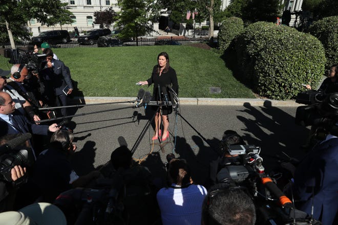 White House Press Secretary Sarah Huckabee Sanders talks to reporters after an interview with FOX News outside the West Wing, June 11, 2019 in Washington, DC.
